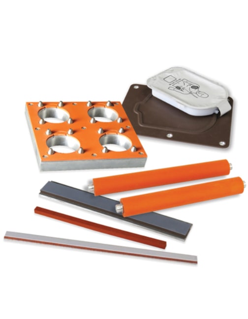 United Silicone custom heat seal tooling including (clockwise from top left) rigid packaging silicone bonded support fixture or part holding fixture, silicone bonded head, silicone bonded rollers and silicone bonded and Teflon-silicone bonded seal bars and seal jaws. 