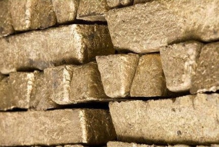 Bronze ingots or metal blocks.