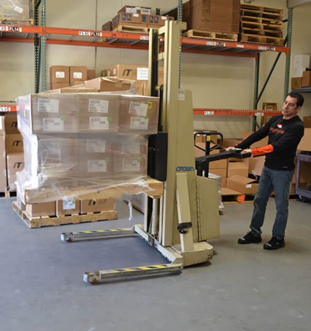 ISM’s Warehouse/Facilities Manager Marty with a Ford Motor Company shipment