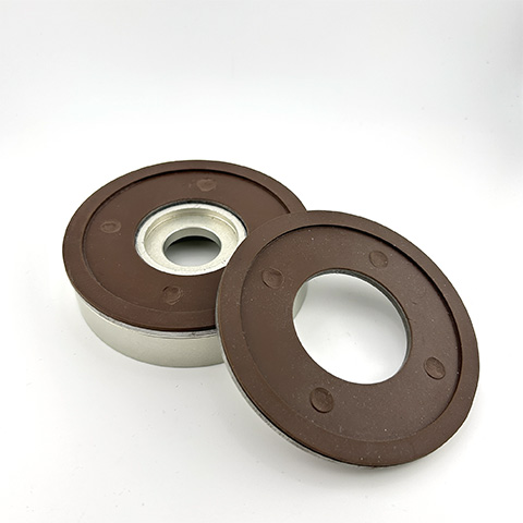 a silicone coated heat seal head used to seal yogurt cups