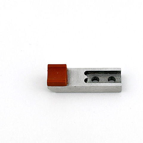 a small metal tool with a silicone tip